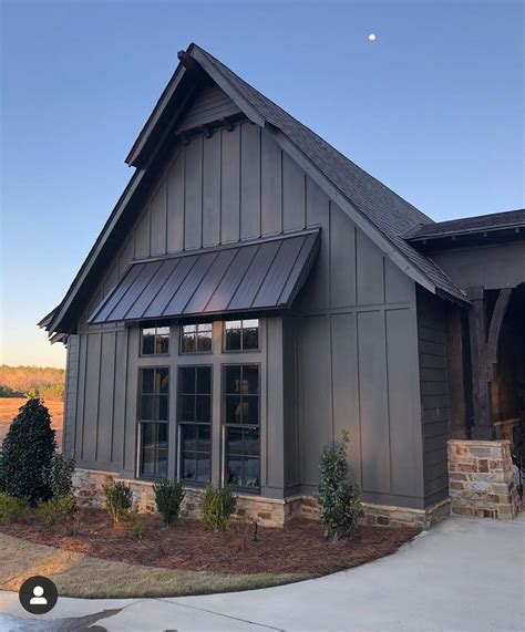 green house with black metal roof|exterior paint with black roof.